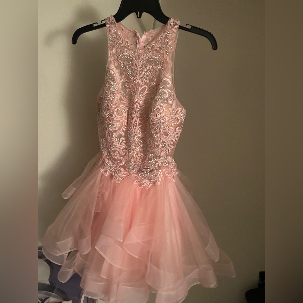 Dressed was used for Sweet 16 Celebration and was worn once.